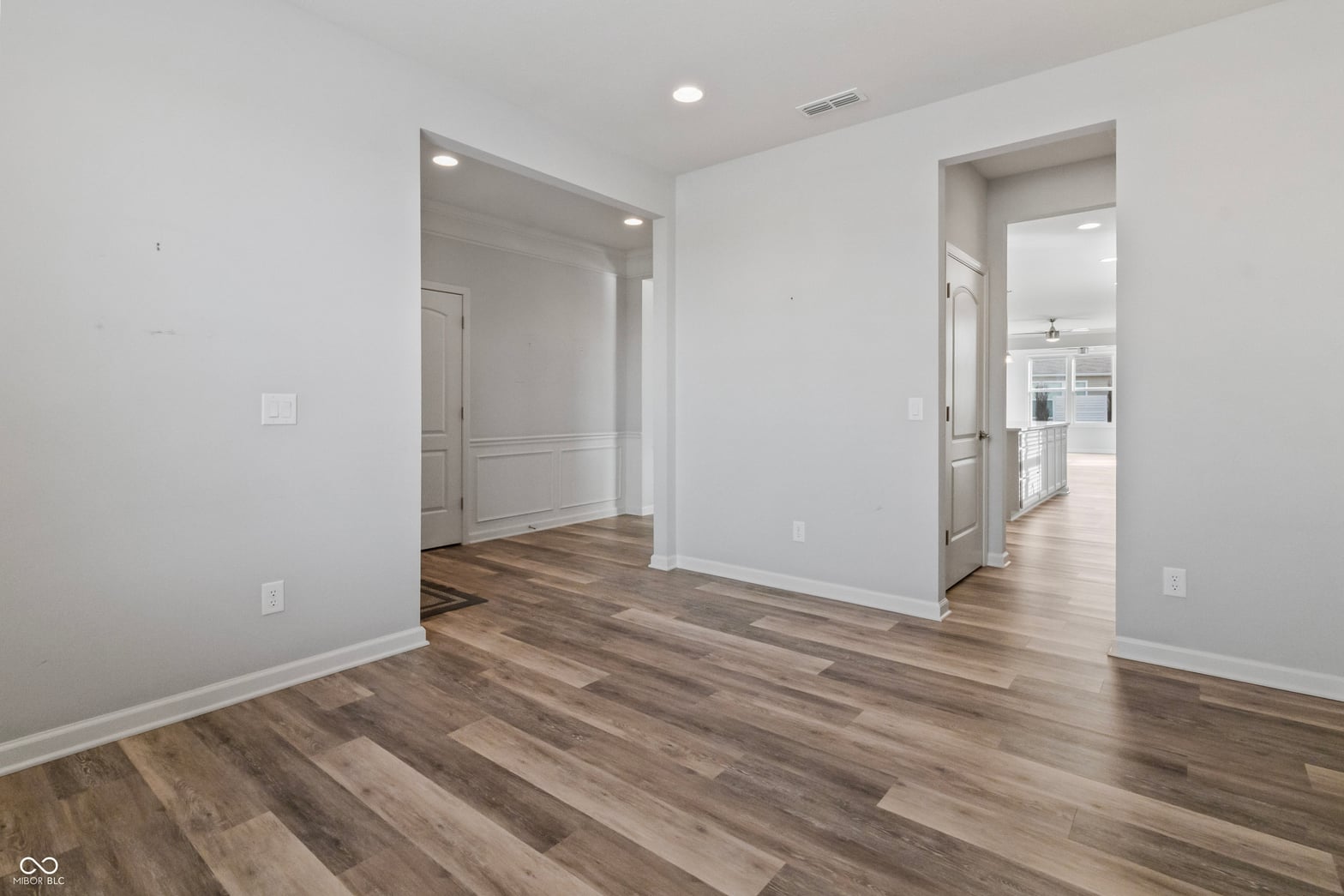 Spacious primary suite with luxury walk-in closet.