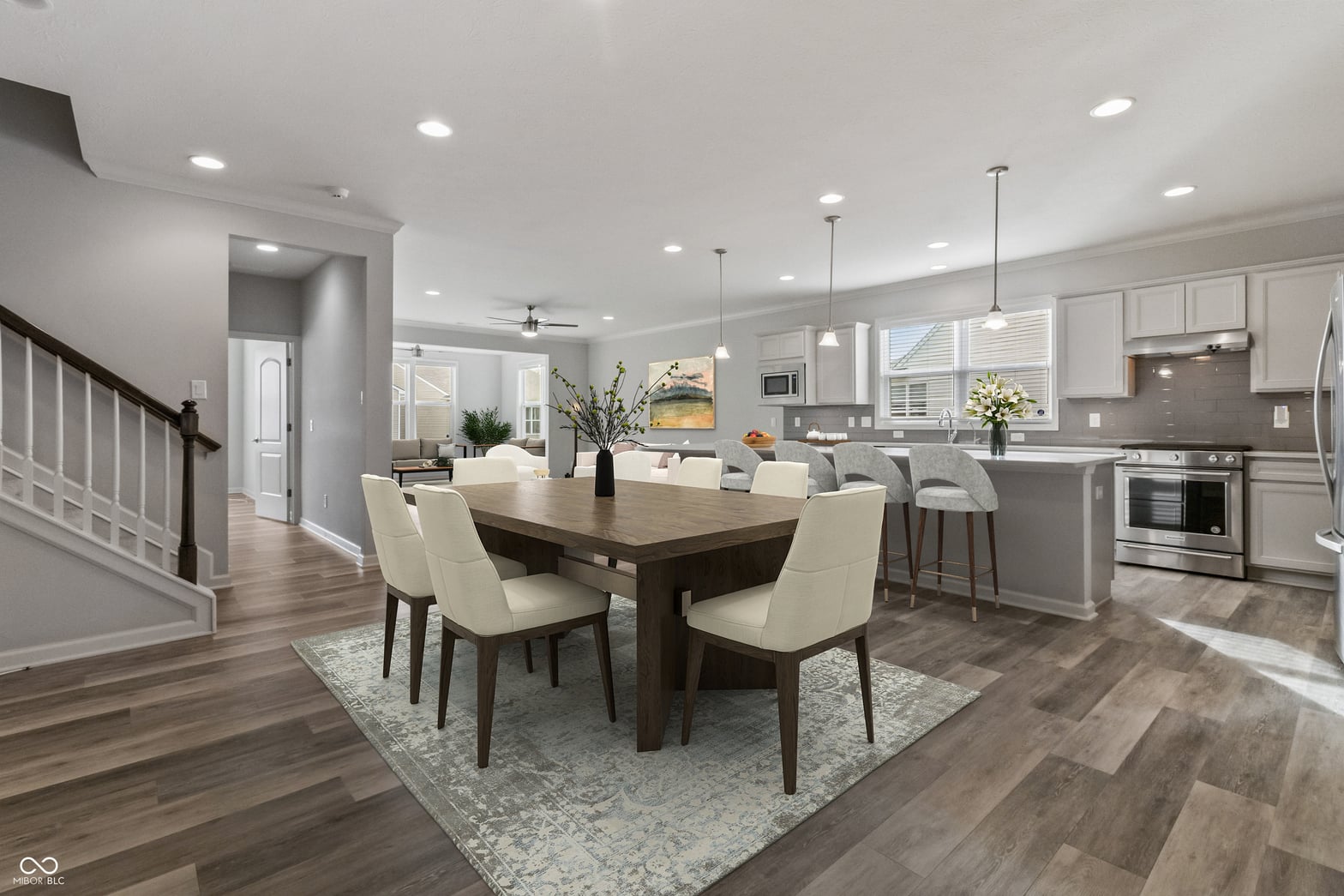 Modern open-concept dining and kitchen with premium finishes.