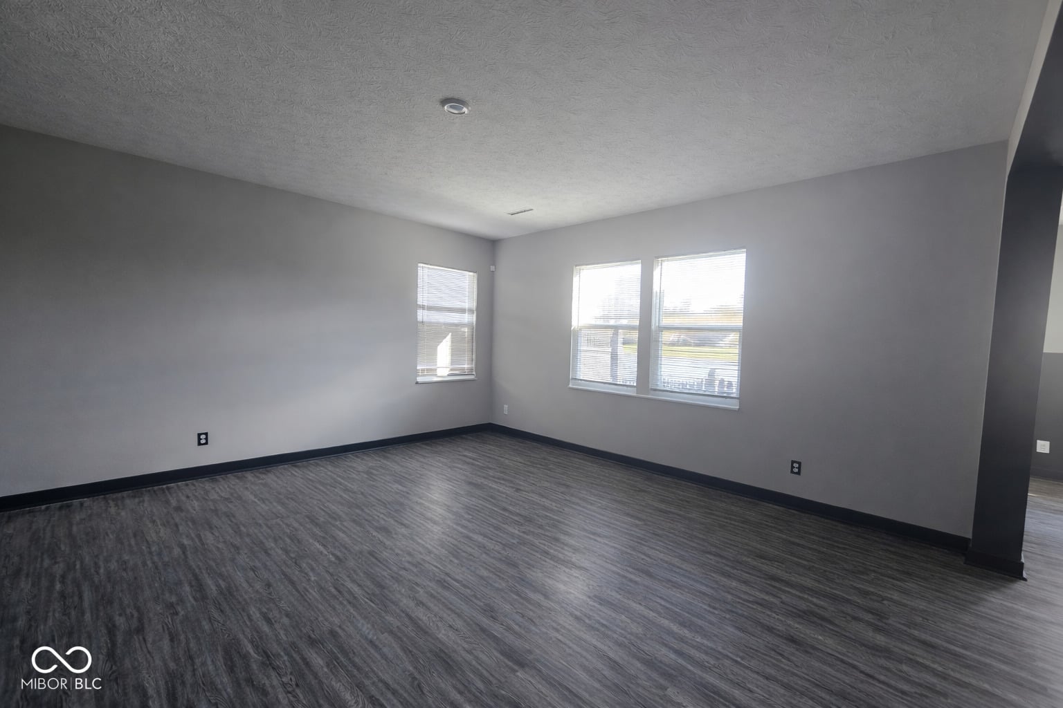 Bright living space with modern finishes and natural light.