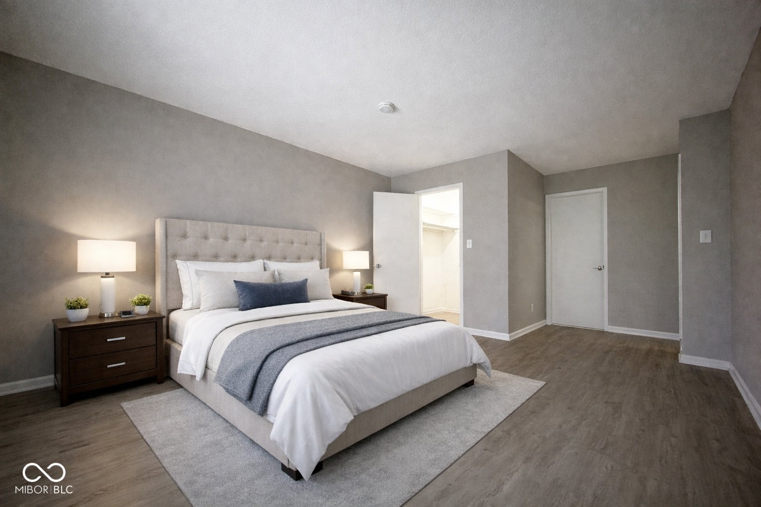 Spacious primary suite with walk-in closet and ensuite.