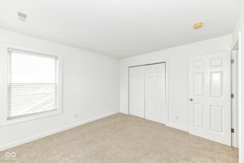 Primary bedroom at 11035 Cool Winds Way, Fishers, IN