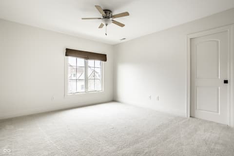 Bedroom at 13429 Boxelder Court, Carmel, IN — Bright, spacious bedroom with excellent natural light.