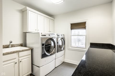 Laundry room at 13429 Boxelder Court, Carmel, IN
