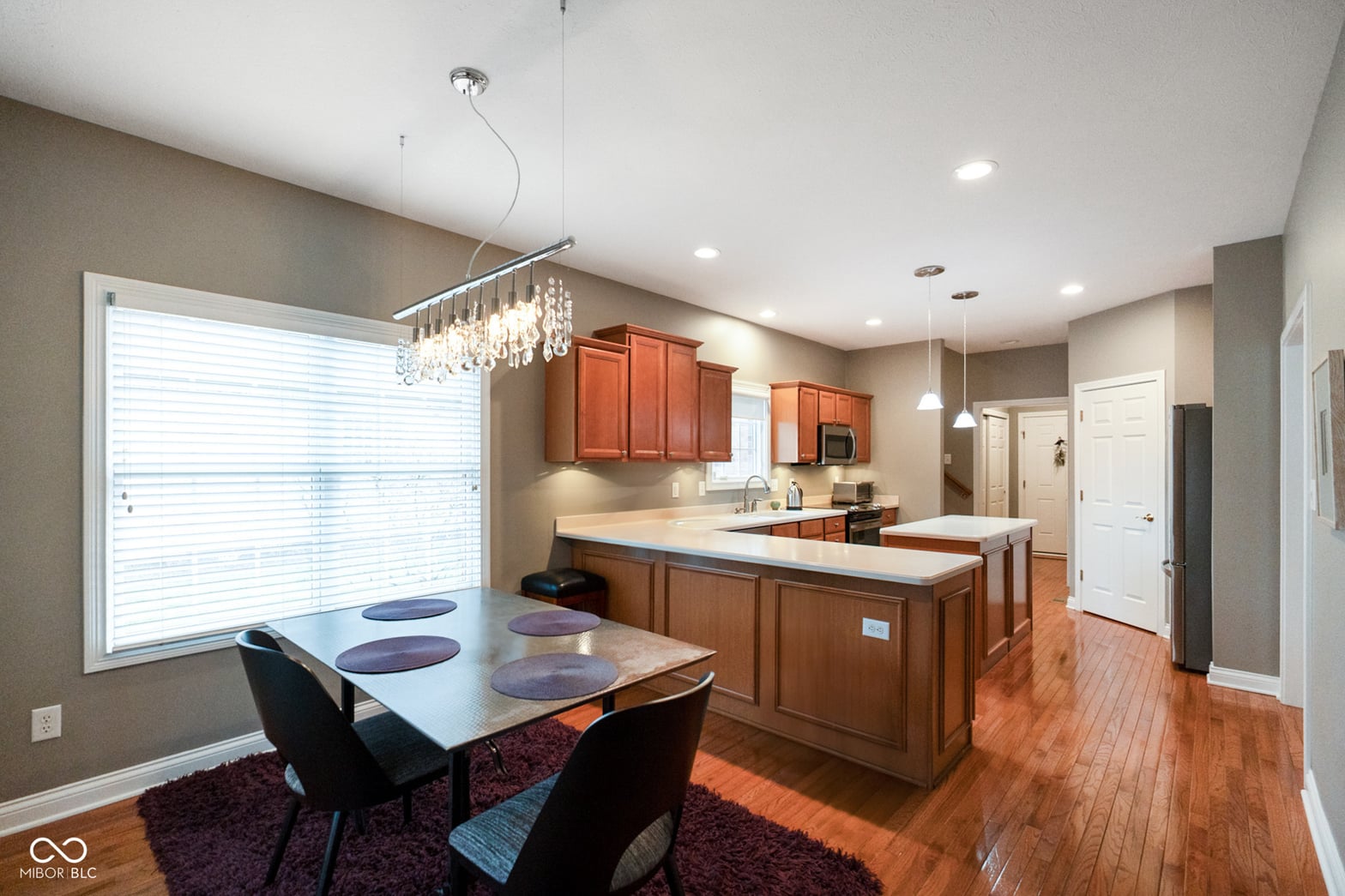 Spacious kitchen with large island and elegant finishes.