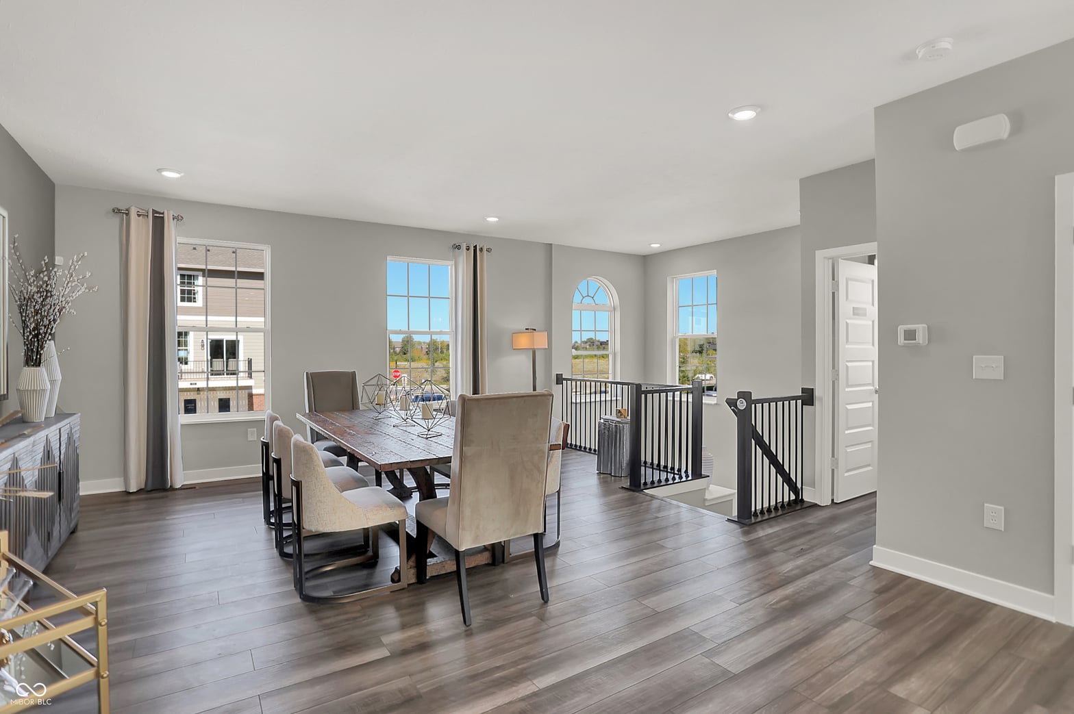 Bright open-concept dining area with abundant natural light.