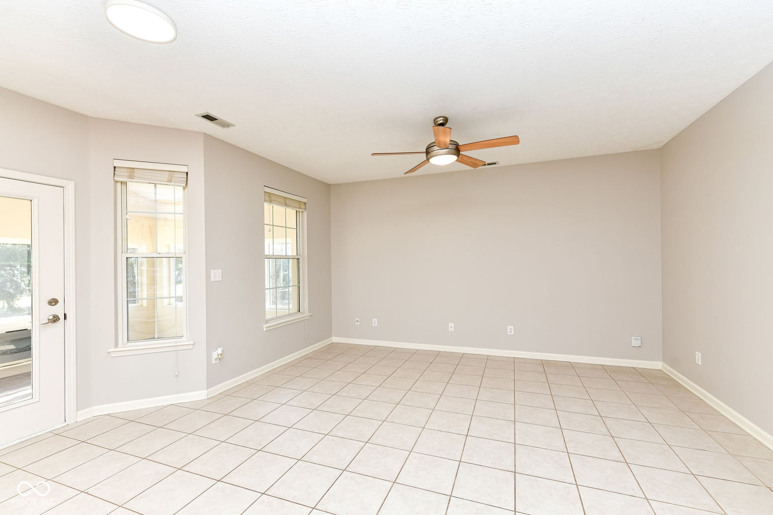 Bright, open family room with abundant natural light.