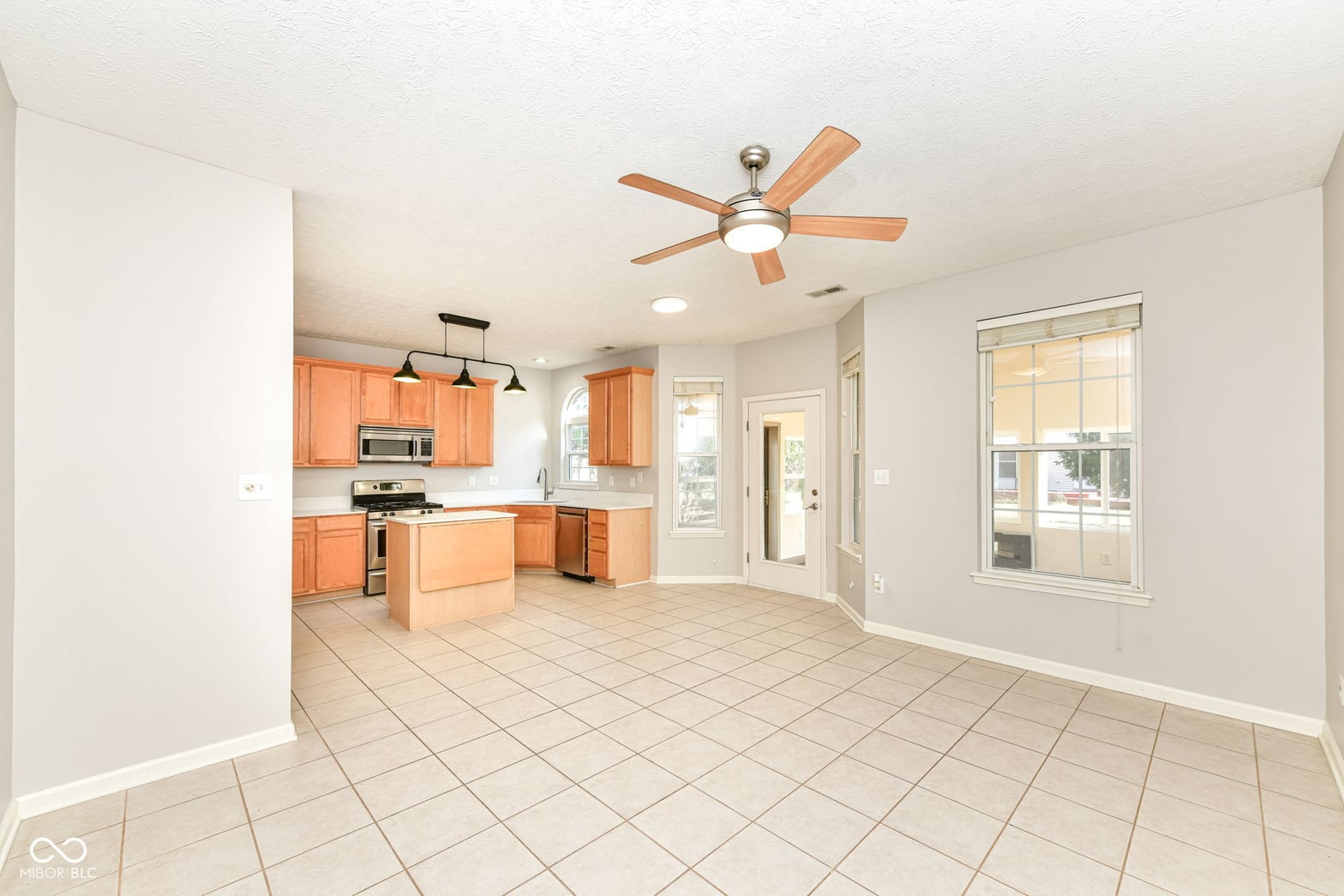 Bright updated kitchen with island and open layout.