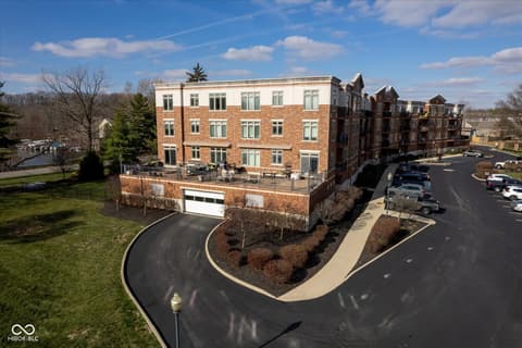 Front exterior at 20971 Shoreline Court, Noblesville, IN — Modern multi-unit brick building with contemporary design.