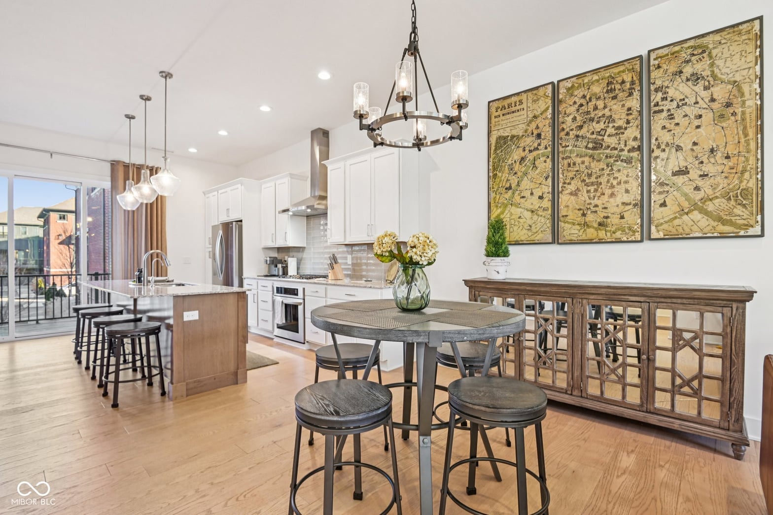 Bright open-concept kitchen and dining with designer finishes.
