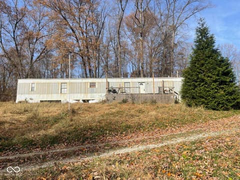 11077 E Rader Lane