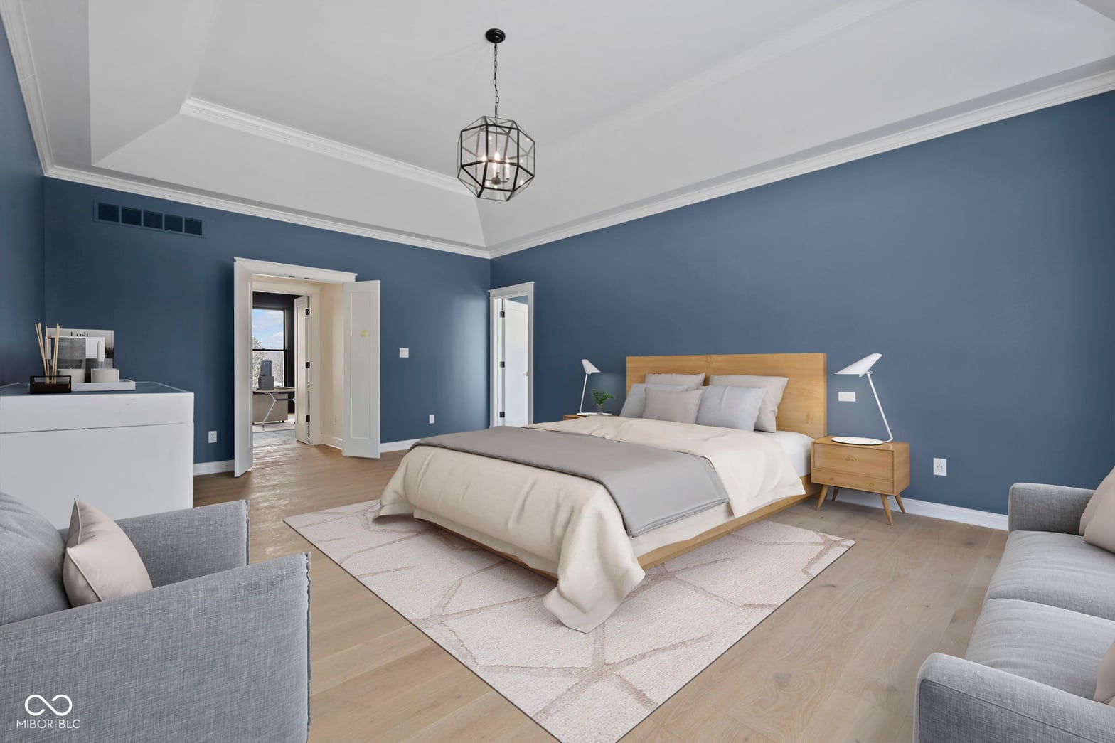 Spacious primary suite with ensuite bath and sitting area.