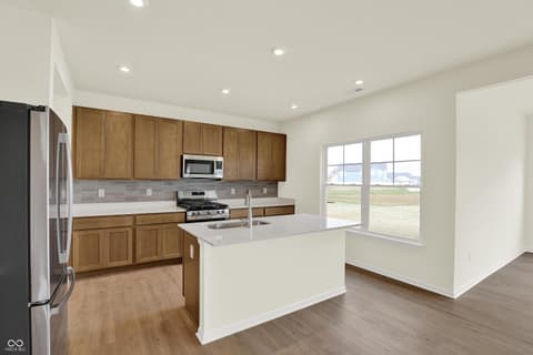 Kitchen at 3944 E 191st Street, Westfield, IN — Bright new kitchen with island and ample natural light.
