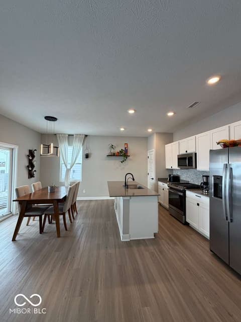 Kitchen at 19994 Edwick Drive, Westfield, IN — Modern kitchen with island and stainless steel appliances.