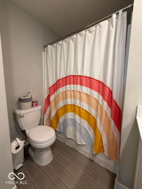 Bathroom at 19994 Edwick Drive, Westfield, IN — Clean, modern bathroom with contemporary tile flooring.