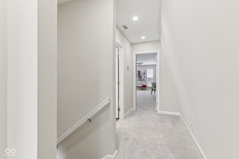 Hallway at 38 Homestead Drive, Sheridan, IN — Bright, spacious hallway with modern recessed lighting.