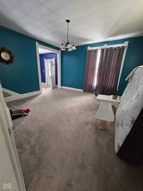 Living room at 127 S Madison Street, Knightstown, IN
