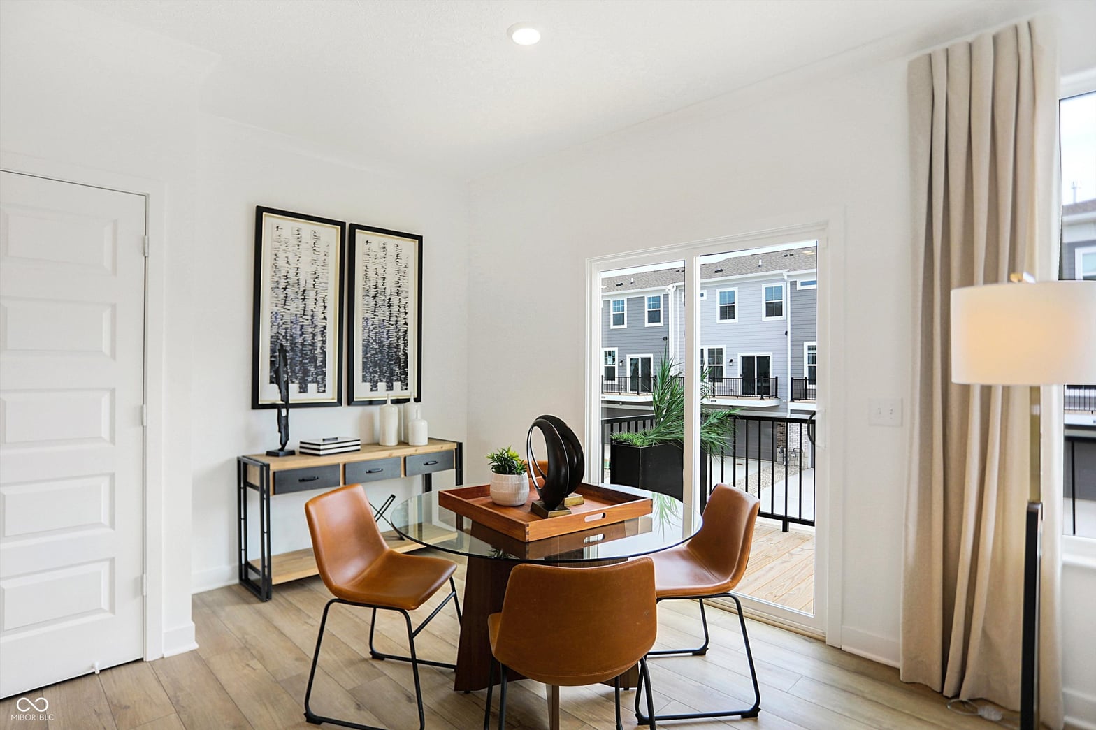 Bright contemporary dining with direct patio access.