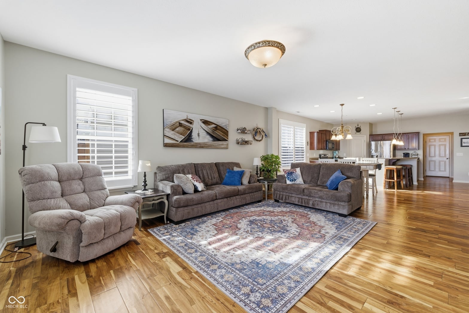 Spacious living room with hardwood floors and open layout.