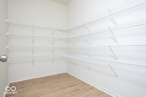 Pantry at 5300 Veranda Drive, Noblesville, IN — Spacious pantry with extensive wire shelving system.