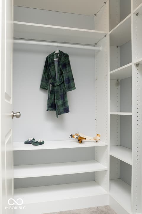 Bonus room at 5300 Veranda Drive, Noblesville, IN — Spacious built-in closet with abundant adjustable shelving.