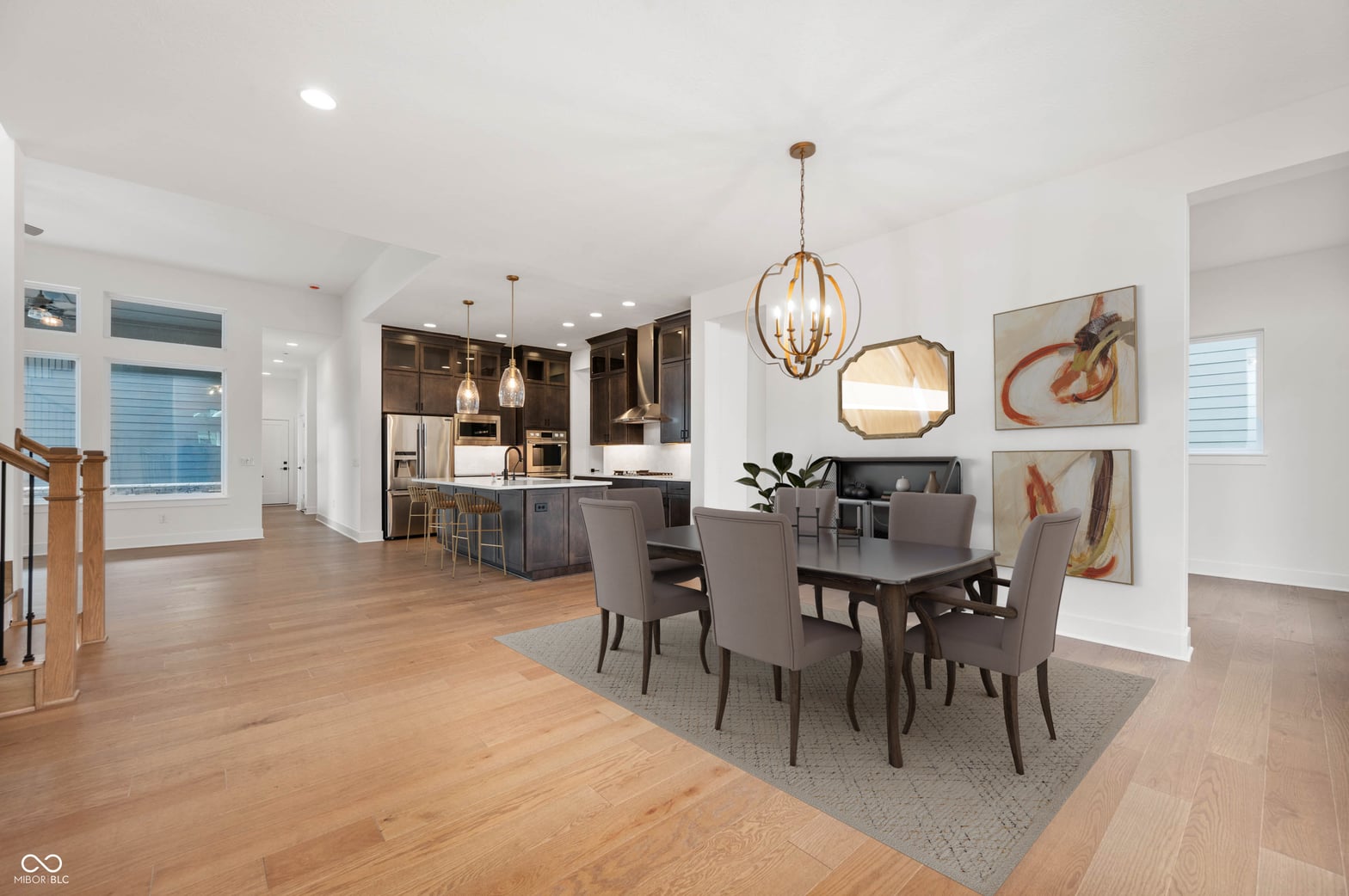 Bright open-concept dining with premium finishes and natural light.
