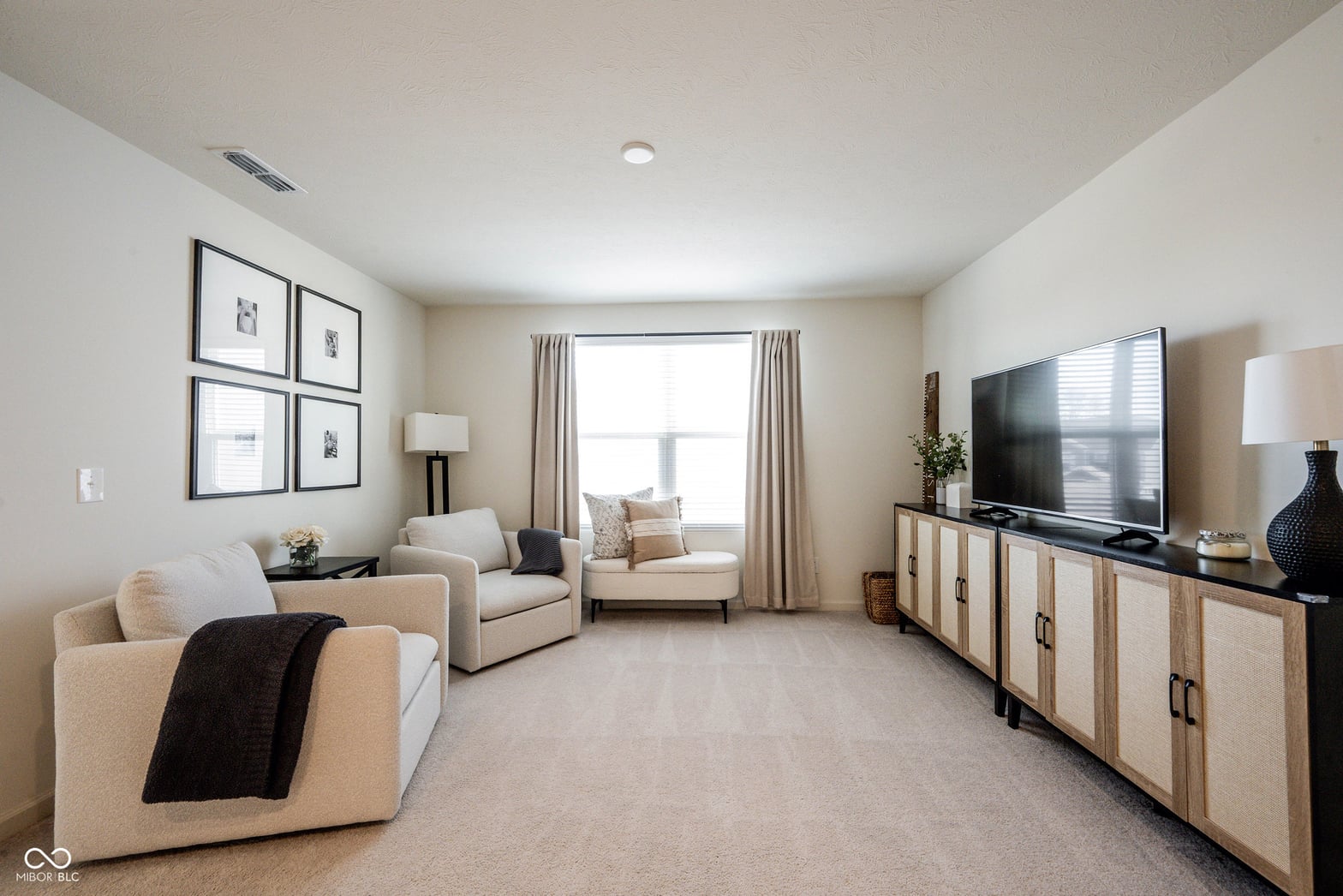 Bright, modern family room with excellent natural light.