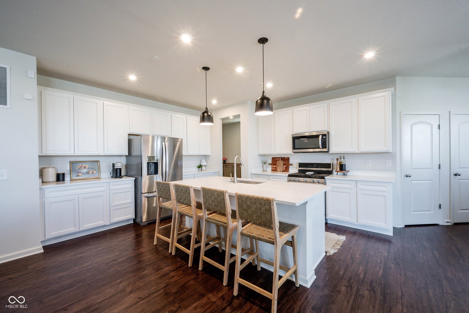 Bright modern kitchen with large island and premium finishes.