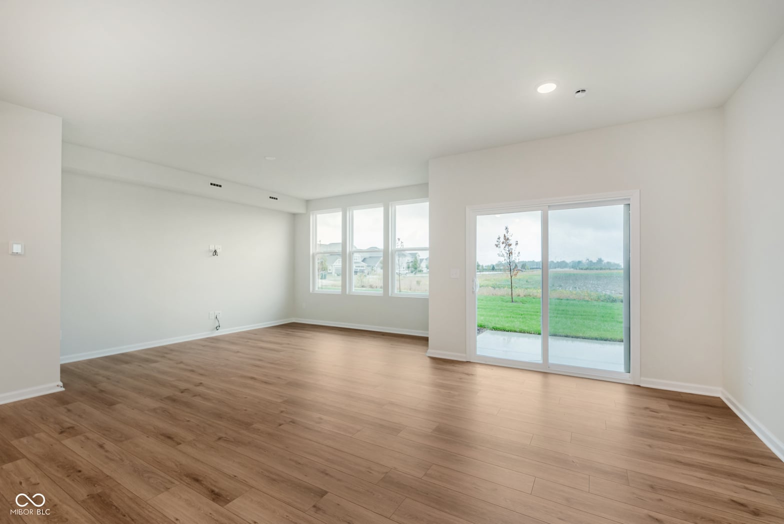 Bright open living space with countryside views and modern finishes.