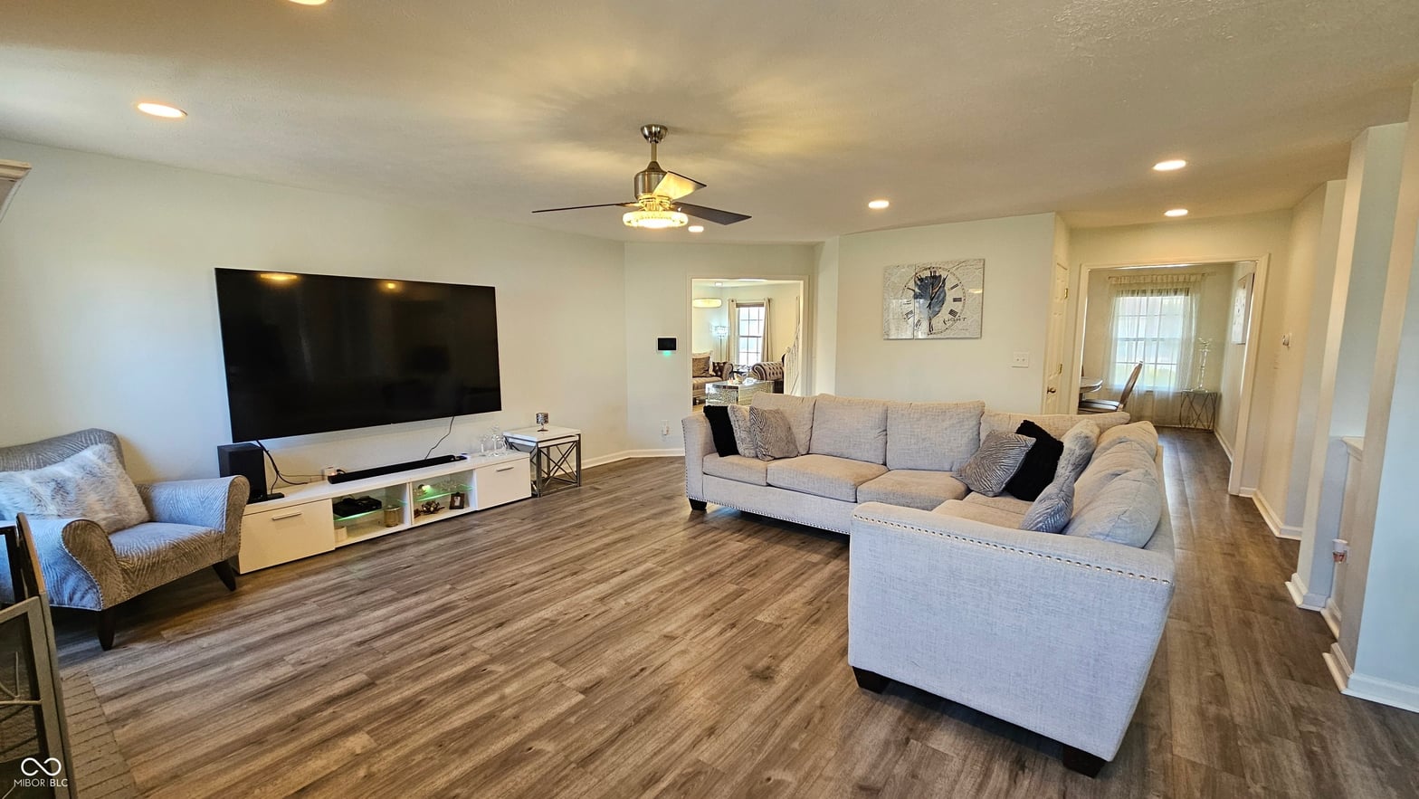Spacious family room with modern amenities and open layout.
