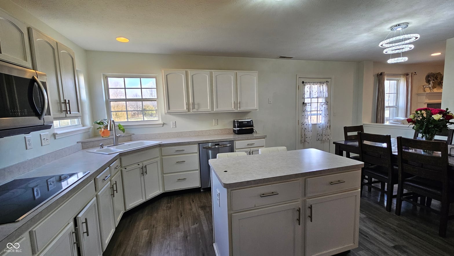 Spacious updated kitchen with island and open floor plan.