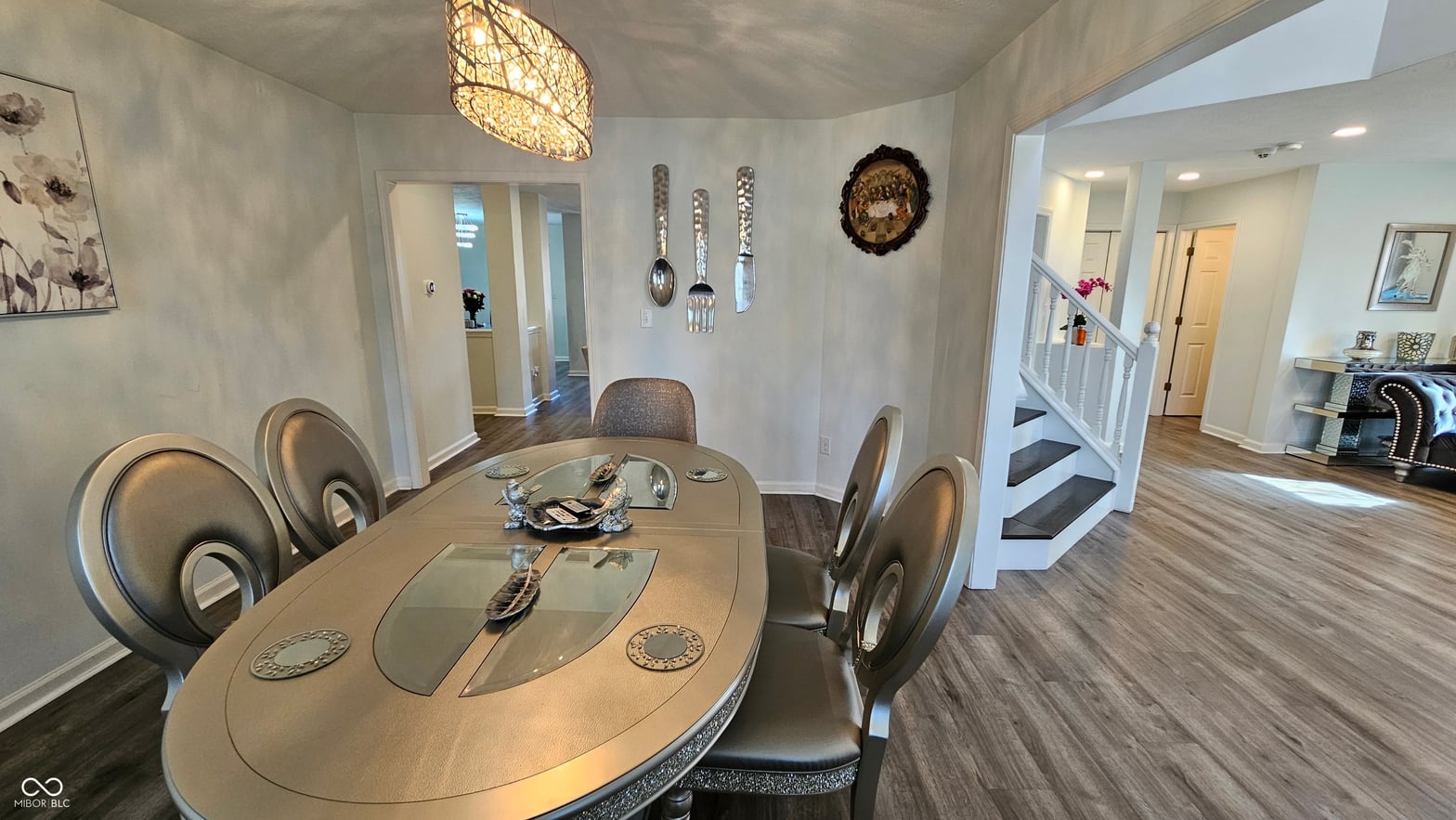 Modern dining with skylights and open floor plan design.