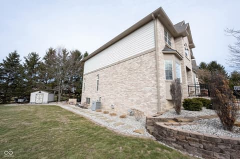 Side exterior at 558 Fox Lane, Carmel, IN