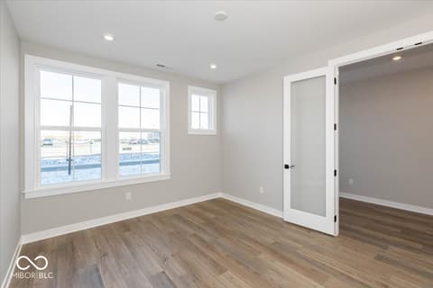 Primary bedroom at 436 Elite Street, Westfield, IN — Bright primary bedroom with water views and modern finishes.