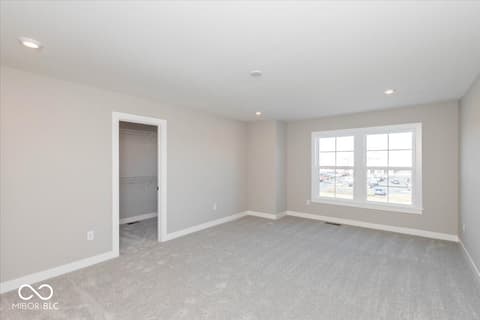 Bonus room at 436 Elite Street, Westfield, IN — Bright bonus room with large windows and walk-in closet.