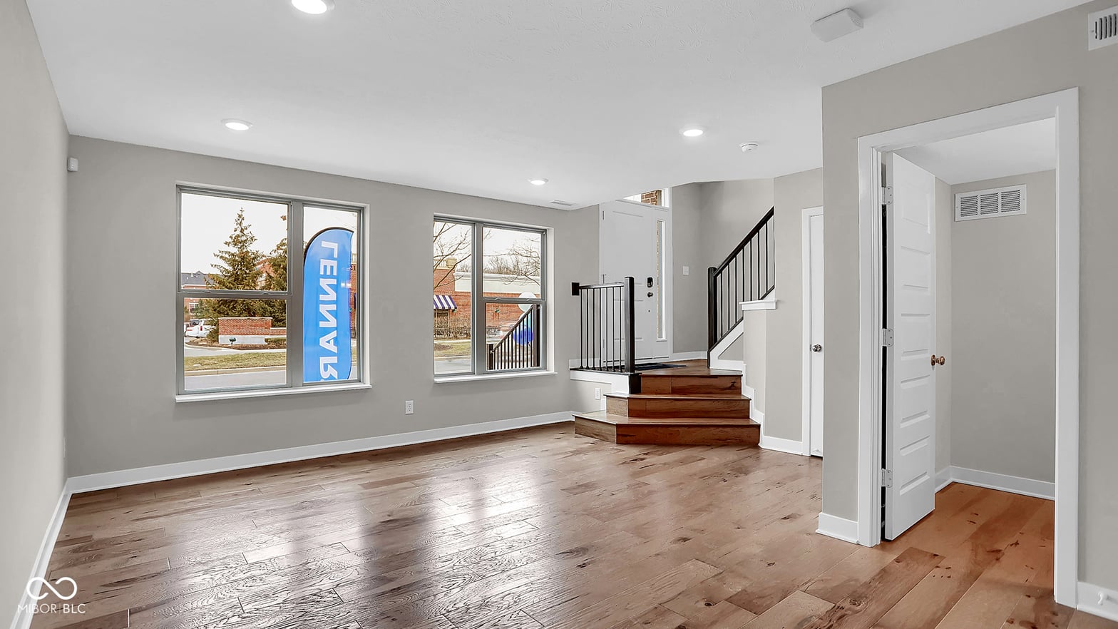 Bright open living space with modern finishes and natural light.