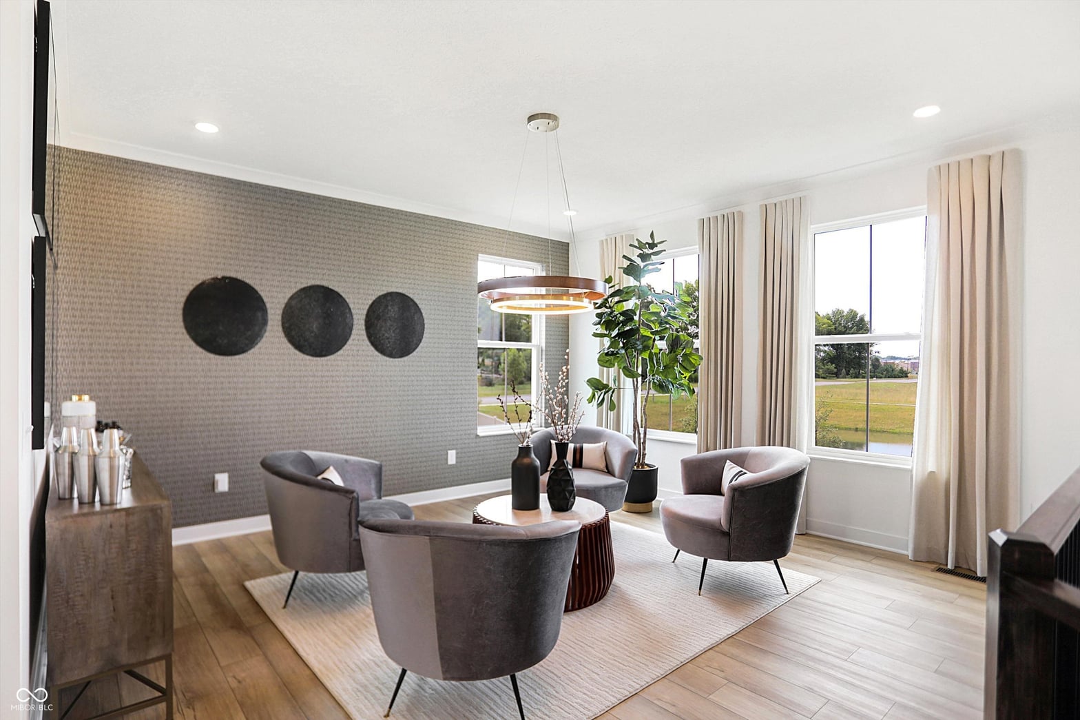 Bright contemporary living room with abundant natural light.