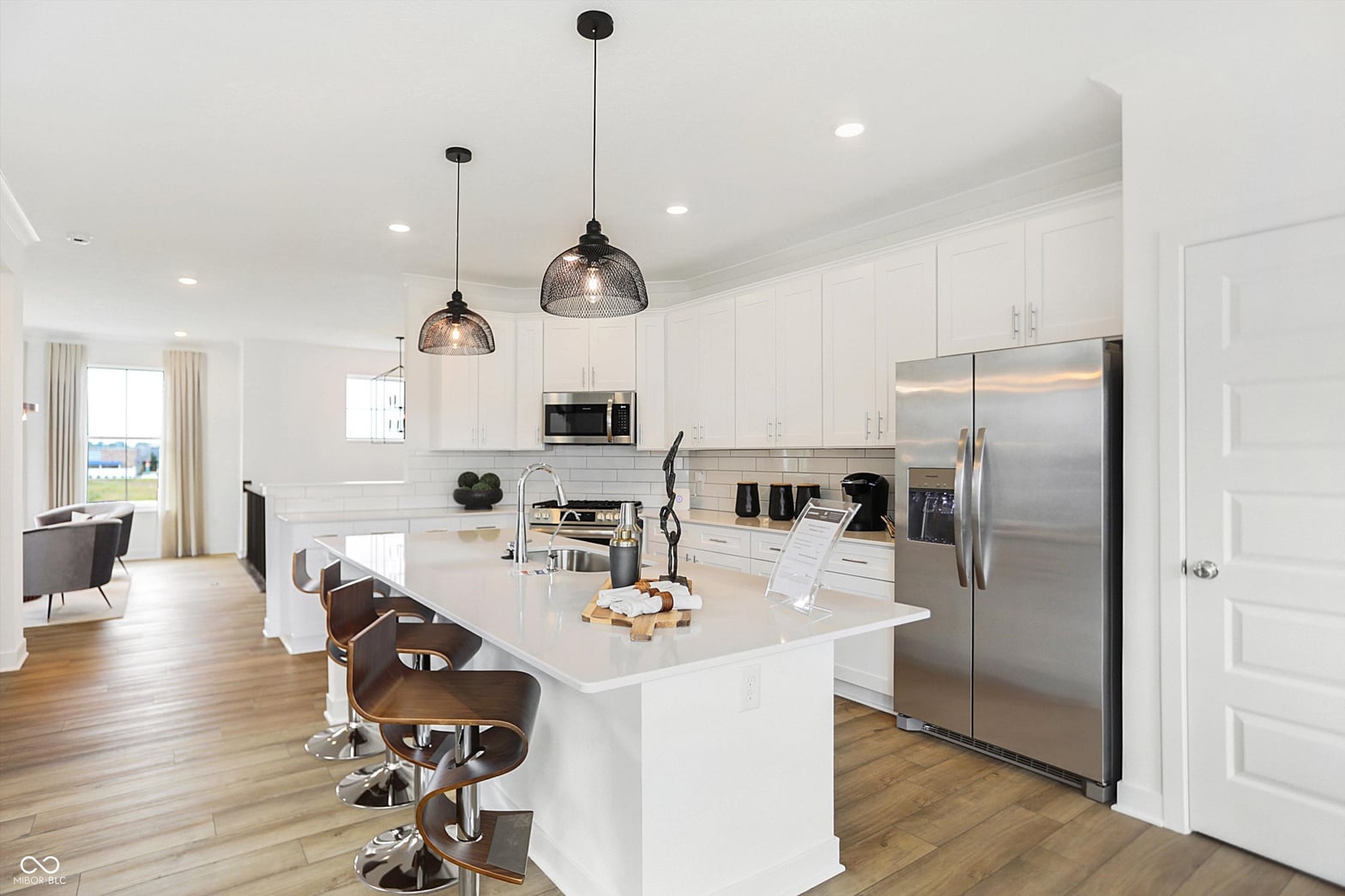 Bright modern kitchen with large island and premium finishes.