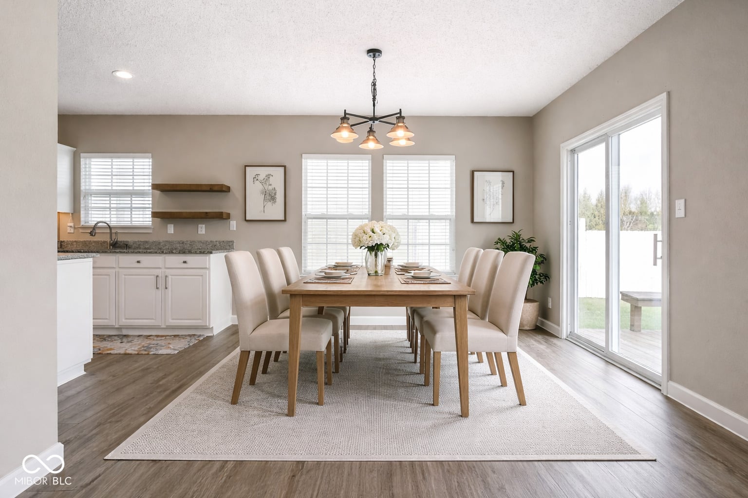 Bright open concept dining with premium finishes and natural light.