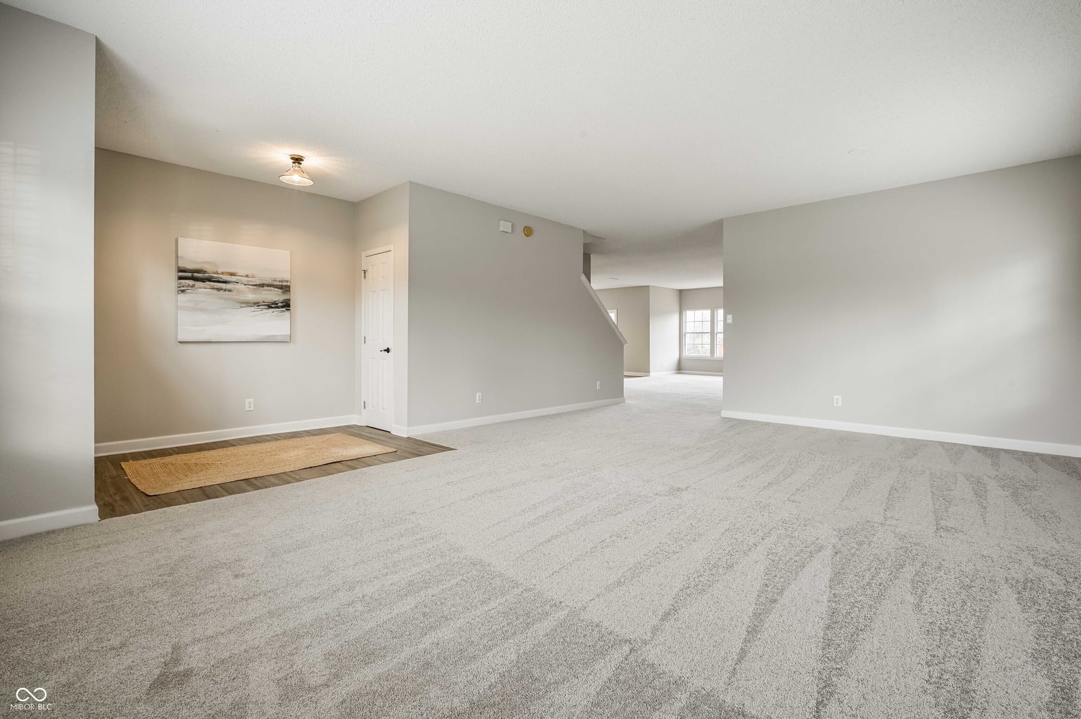 Bright, spacious open-concept family room with modern finishes.