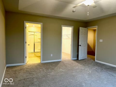 Primary bedroom at 9789 Mystic Sun Court, Fishers, IN