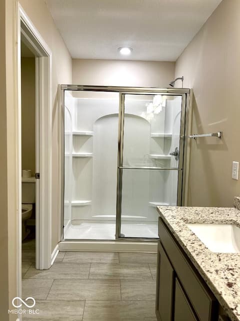Primary bathroom at 9789 Mystic Sun Court, Fishers, IN