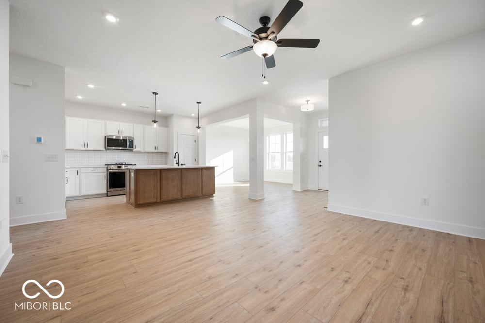 Bright open-concept kitchen with modern finishes and flow.