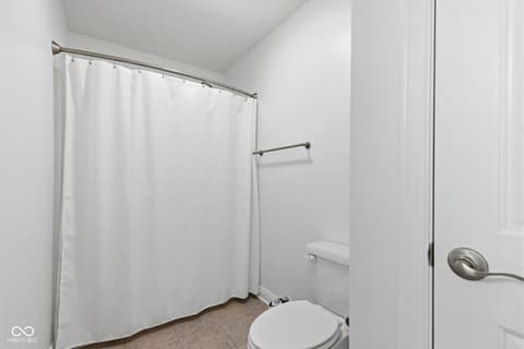 Bathroom at 13867 Smokey Ridge Drive, Carmel, IN — Clean, bright bathroom with modern fixtures and finishes.