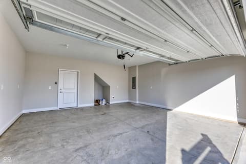 Garage at 2412 N Keenan Circle, Westfield, IN — Spacious new garage with excellent natural lighting.
