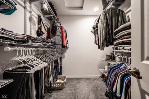 Bonus room at 450 E Pine Ridge Drive, Westfield, IN — Spacious walk-in closet with premium organizational systems.