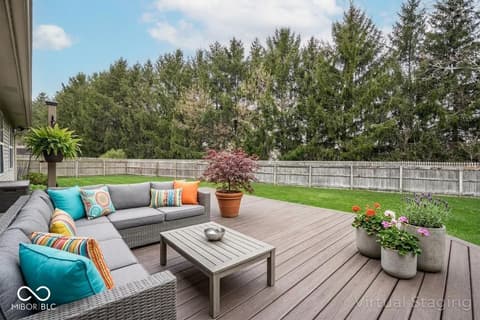 Outdoor living area at 450 E Pine Ridge Drive, Westfield, IN — Spacious composite deck with modern outdoor living setup.