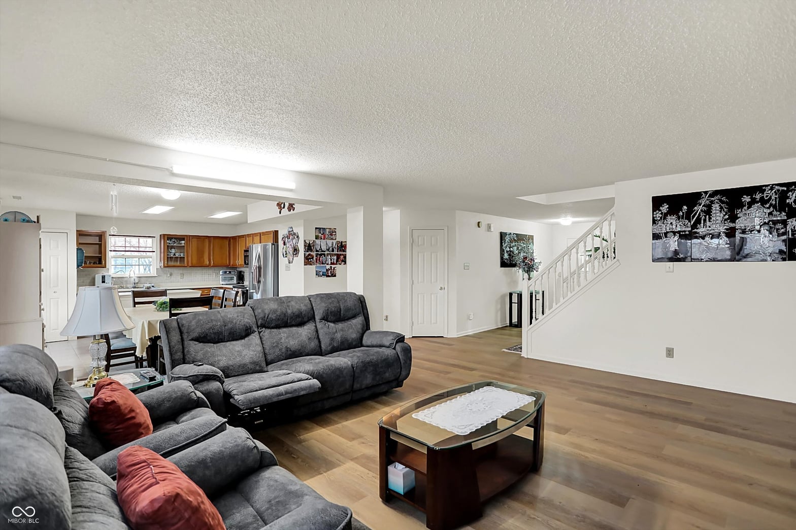 Spacious open-concept living with hardwood floors and modern amenities.