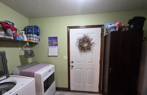 Laundry room at 201 S Westwood Drive, Westport, IN