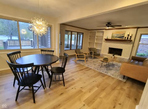 Living room at 72 Ashbourne Drive, Noblesville, IN — Spacious open living with fireplace and water views