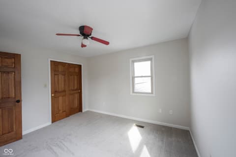 Bedroom at 72 Ashbourne Drive, Noblesville, IN — Bright bedroom with natural light and closet storage.